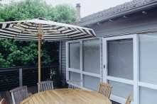 Made in the Shade Classic Timber Umbrella with striped canopy